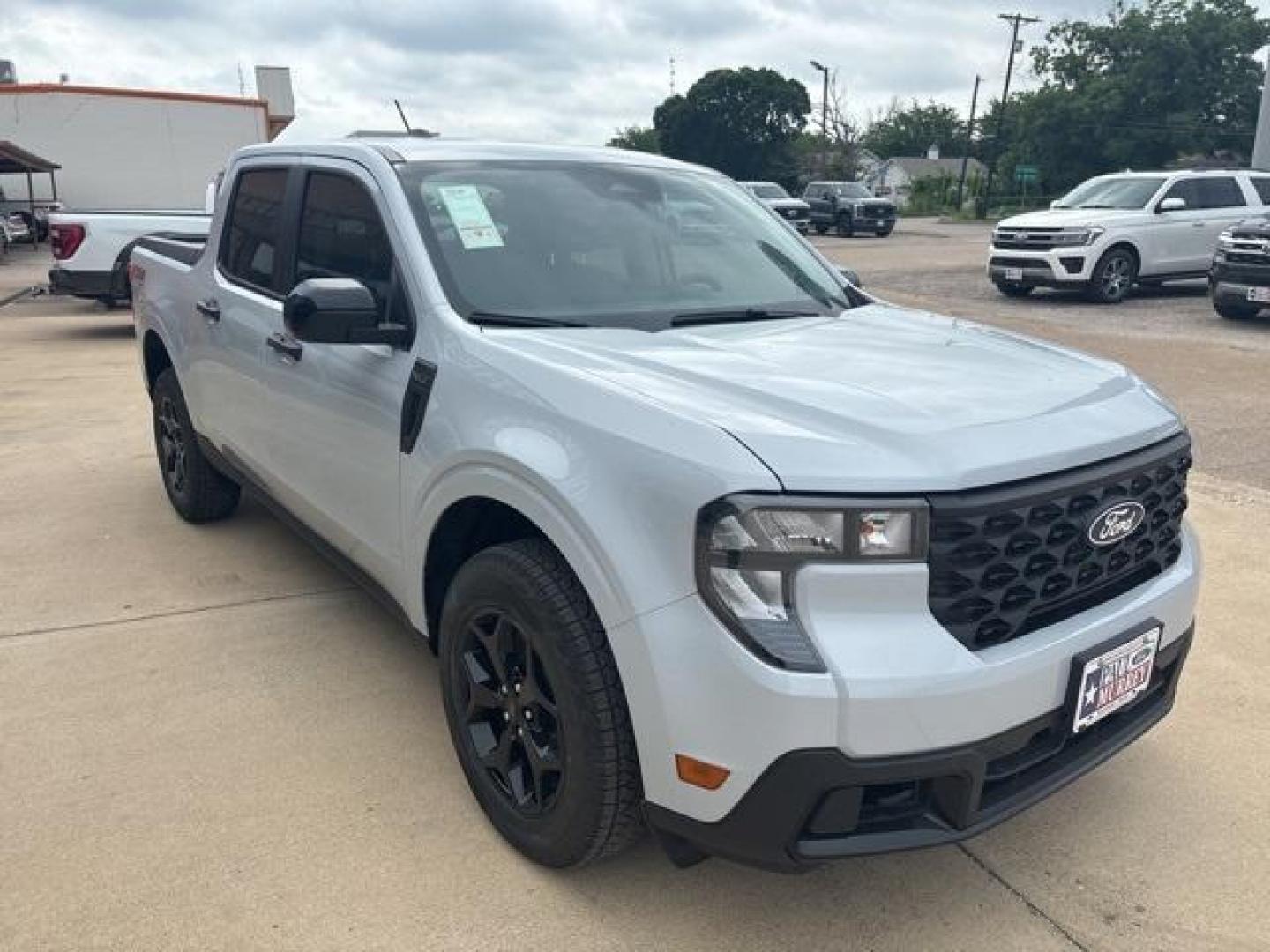 2025 White Metallic /Navy Pier/Aspen Gray Ford Maverick XLT (3FTTW8JA8SR) with an EcoBoost 2.0L I4 GTDi DOHC Turbocharged VCT engine, CVT transmission, located at 1105 E Mulberry, Kaufman, TX, 75142, (972) 962-2151, 32.589550, -96.300926 - White Metallic 2025 Ford Maverick 4D Crew Cab XLT AWD CVT EcoBoost 2.0L I4 GTDi DOHC Turbocharged VCT<br><br>40/34 City/Highway MPG<br><br><br>Please call Paul Murrey Ford Inc. In Kaufman Texas A Family Dealership Since 1952 Serving the Dallas Fort Worth and East Texas areas for over 70 years. Pleas - Photo#6