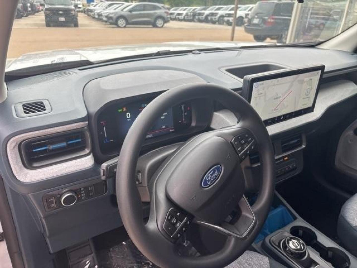 2025 Space White Metallic /Blue Ford Maverick XLT (3FTTW8H38SR) with an 2.5L I-4 Hybrid engine, CVT transmission, located at 1105 E Mulberry, Kaufman, TX, 75142, (972) 962-2151, 32.589550, -96.300926 - Space White Metallic 2025 Ford Maverick 4D Crew Cab XLT FWD CVT 2.5L I-4 Hybrid 2.5L I-4 Hybrid.<br><br>Recent Arrival! 42/35 City/Highway MPG<br><br><br>Please call Paul Murrey Ford Inc. In Kaufman Texas A Family Dealership Since 1952 Serving the Dallas Fort Worth and East Texas areas for over 70 y - Photo#12