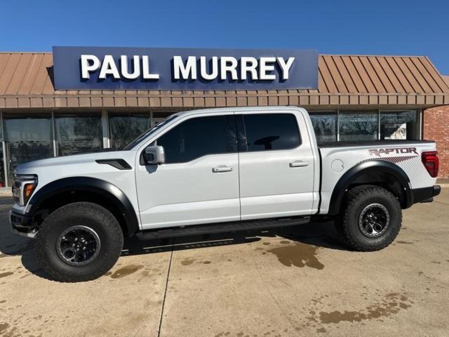 2025 White Metallic /Black Ford F-150 Raptor (1FTFW1RG7SF) with an 3.5L V6 EcoBoost engine, Automatic transmission, located at 1105 E Mulberry, Kaufman, TX, 75142, (972) 962-2151, 32.589550, -96.300926 - White Metallic 2025 Ford F-150 4D SuperCrew Raptor 4WD 10-Speed Automatic 3.5L V6 EcoBoost 4WD.<br><br><br>Recent Arrival! Odometer is 2448 miles below market average!<br><br><br>Please call Paul Murrey Ford Inc. In Kaufman Texas A Family Dealership Since 1952 Serving the Dallas Fort Worth and East - Photo#0