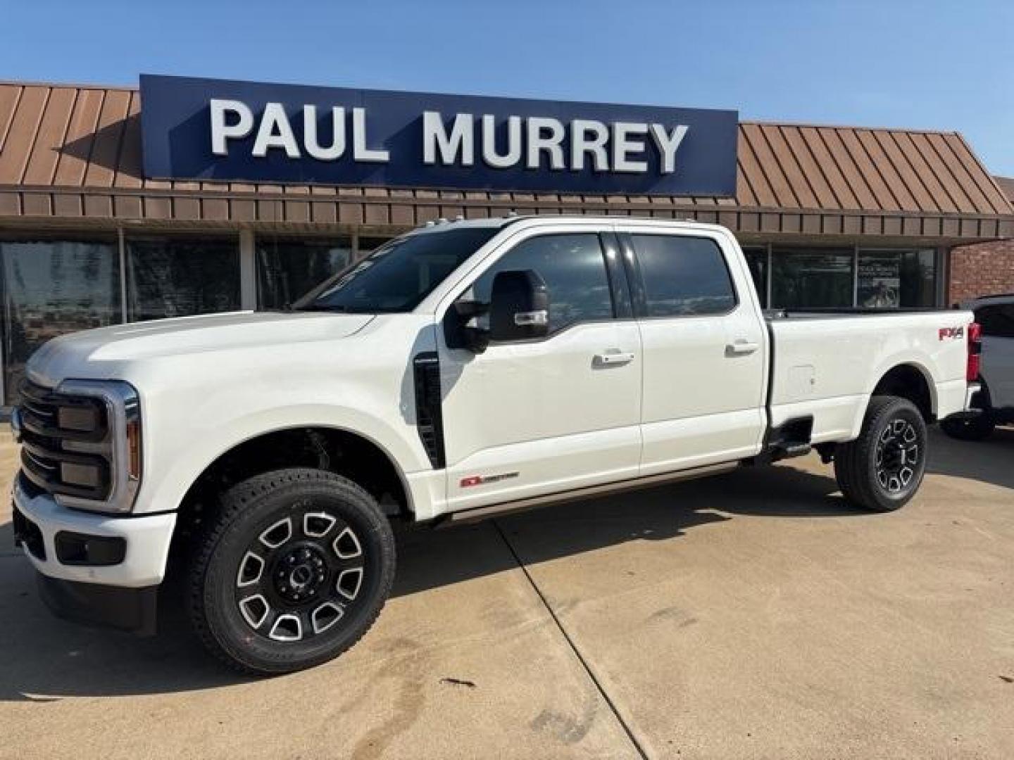 2025 Star White Metallic Tri-Coat /Black Onyx Ford F-350SD Platinum (1FT8W3BMXSE) with an 6.7L High Output Power Stroke V8 Diesel engine, Automatic transmission, located at 1105 E Mulberry, Kaufman, TX, 75142, (972) 962-2151, 32.589550, -96.300926 - Star White Metallic Tri-Coat 2025 Ford F-350SD 4D Crew Cab Platinum 4WD 10-Speed Automatic 6.7L High Output Power Stroke V8 Diesel 4WD.<br><br><br>Please call Paul Murrey Ford Inc. In Kaufman Texas A Family Dealership Since 1952 Serving the Dallas Fort Worth and East Texas areas for over 70 years. P - Photo#2