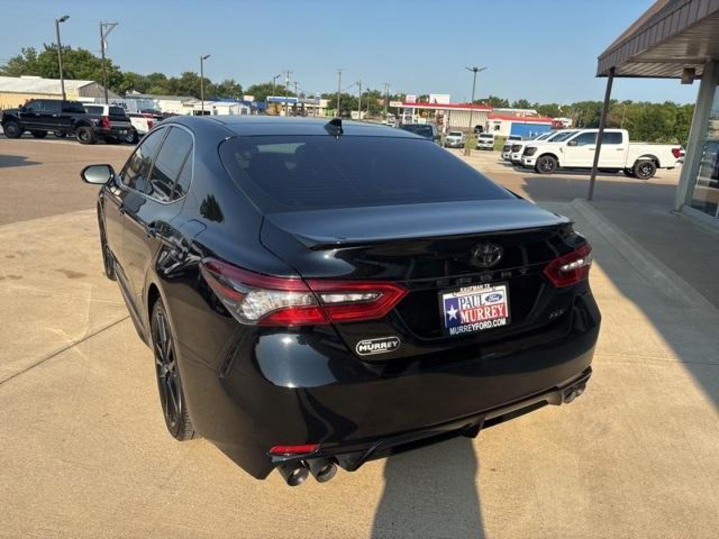 2021 Midnight Black Metallic Toyota Camry XSE (4T1K61AK4MU) with an 2.5L I4 DOHC 16V engine, Automatic transmission, located at 1105 E Mulberry, Kaufman, TX, 75142, (972) 962-2151, 32.589550, -96.300926 - Black 2021 Toyota Camry 4D Sedan XSE FWD 8-Speed Automatic 2.5L I4 DOHC 16V Leather.<br><br><br>Recent Arrival! 27/38 City/Highway MPG<br><br><br>Please call Paul Murrey Ford Inc. In Kaufman Texas A Family Dealership Since 1952 Serving the Dallas Fort Worth and East Texas areas for over 70 years. Pl - Photo#2