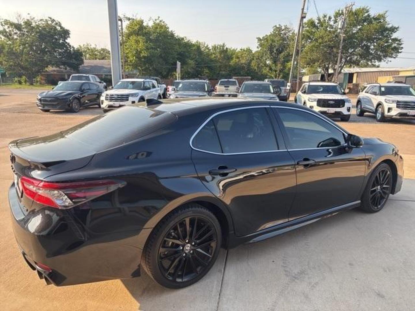 2021 Midnight Black Metallic Toyota Camry XSE (4T1K61AK4MU) with an 2.5L I4 DOHC 16V engine, Automatic transmission, located at 1105 E Mulberry, Kaufman, TX, 75142, (972) 962-2151, 32.589550, -96.300926 - Black 2021 Toyota Camry 4D Sedan XSE FWD 8-Speed Automatic 2.5L I4 DOHC 16V Leather.<br><br><br>Recent Arrival! 27/38 City/Highway MPG<br><br><br>Please call Paul Murrey Ford Inc. In Kaufman Texas A Family Dealership Since 1952 Serving the Dallas Fort Worth and East Texas areas for over 70 years. Pl - Photo#3