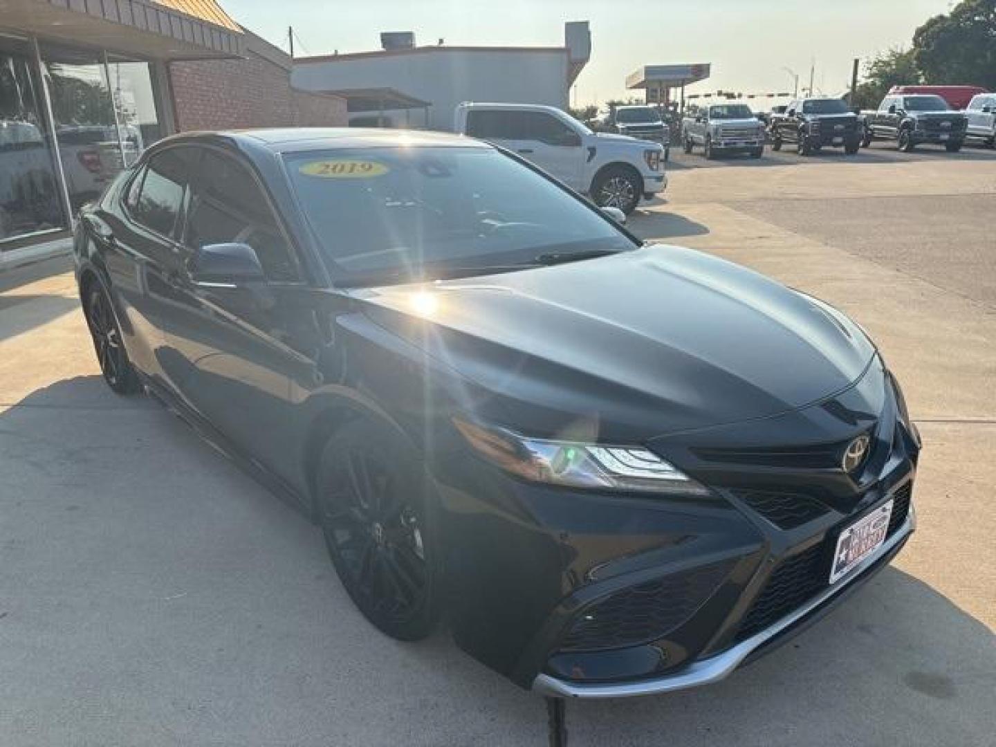 2021 Midnight Black Metallic Toyota Camry XSE (4T1K61AK4MU) with an 2.5L I4 DOHC 16V engine, Automatic transmission, located at 1105 E Mulberry, Kaufman, TX, 75142, (972) 962-2151, 32.589550, -96.300926 - Black 2021 Toyota Camry 4D Sedan XSE FWD 8-Speed Automatic 2.5L I4 DOHC 16V Leather.<br><br><br>Recent Arrival! 27/38 City/Highway MPG<br><br><br>Please call Paul Murrey Ford Inc. In Kaufman Texas A Family Dealership Since 1952 Serving the Dallas Fort Worth and East Texas areas for over 70 years. Pl - Photo#4