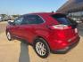 2022 Rapid Red Metallic Tinted Clearcoat /Dune Ford Edge SEL (2FMPK4J99NB) with an EcoBoost 2.0L I4 GTDi DOHC Turbocharged VCT engine, Automatic transmission, located at 1105 E Mulberry, Kaufman, TX, 75142, (972) 962-2151, 32.589550, -96.300926 - Rapid Red Metallic Tinted Clearcoat 2022 Ford Edge 4D Sport Utility SEL AWD 8-Speed Automatic EcoBoost 2.0L I4 GTDi DOHC Turbocharged VCT AWD.<br><br><br>Recent Arrival! Odometer is 20452 miles below market average! 21/28 City/Highway MPG<br><br><br>Please call Paul Murrey Ford Inc. In Kaufman Texas - Photo#2