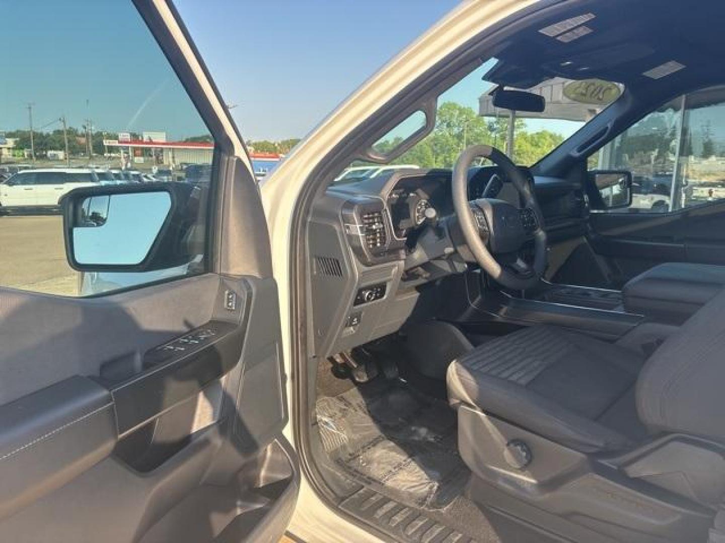 2023 Oxford White /Black Ford F-150 XL (1FTFW1E55PK) with an 5.0L V8 engine, Automatic transmission, located at 1105 E Mulberry, Kaufman, TX, 75142, (972) 962-2151, 32.589550, -96.300926 - Oxford White 2023 Ford F-150 4D SuperCrew XL 4WD 10-Speed Automatic 5.0L V8 4WD.<br><br><br>Recent Arrival! Odometer is 11147 miles below market average!<br><br><br>Please call Paul Murrey Ford Inc. In Kaufman Texas A Family Dealership Since 1952 Serving the Dallas Fort Worth and East Texas areas fo - Photo#9