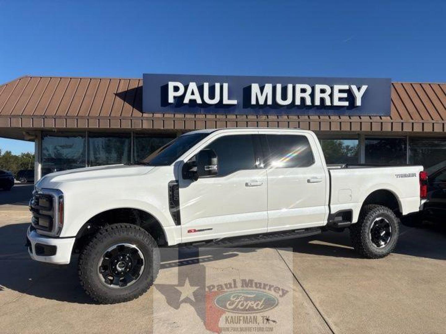 2026 White Metallic /Black Onyx/Platinum Blue Ford F-250SD Platinum (1FT8W2BM5TE) with an 6.7L High Output Power Stroke V8 Diesel engine, Automatic transmission, located at 1105 E Mulberry, Kaufman, TX, 75142, (972) 962-2151, 32.589550, -96.300926 - $5,541 off MSRP!<br><br>4WD, ABS brakes, Alloy wheels, Compass, Electronic Stability Control, Front dual zone A/C, Heated door mirrors, Heated front seats, Heated rear seats, Illuminated entry, Low tire pressure warning, Remote keyless entry, Traction control.<br>Star White Metallic Tri-Coat 2026 Fo - Photo#0