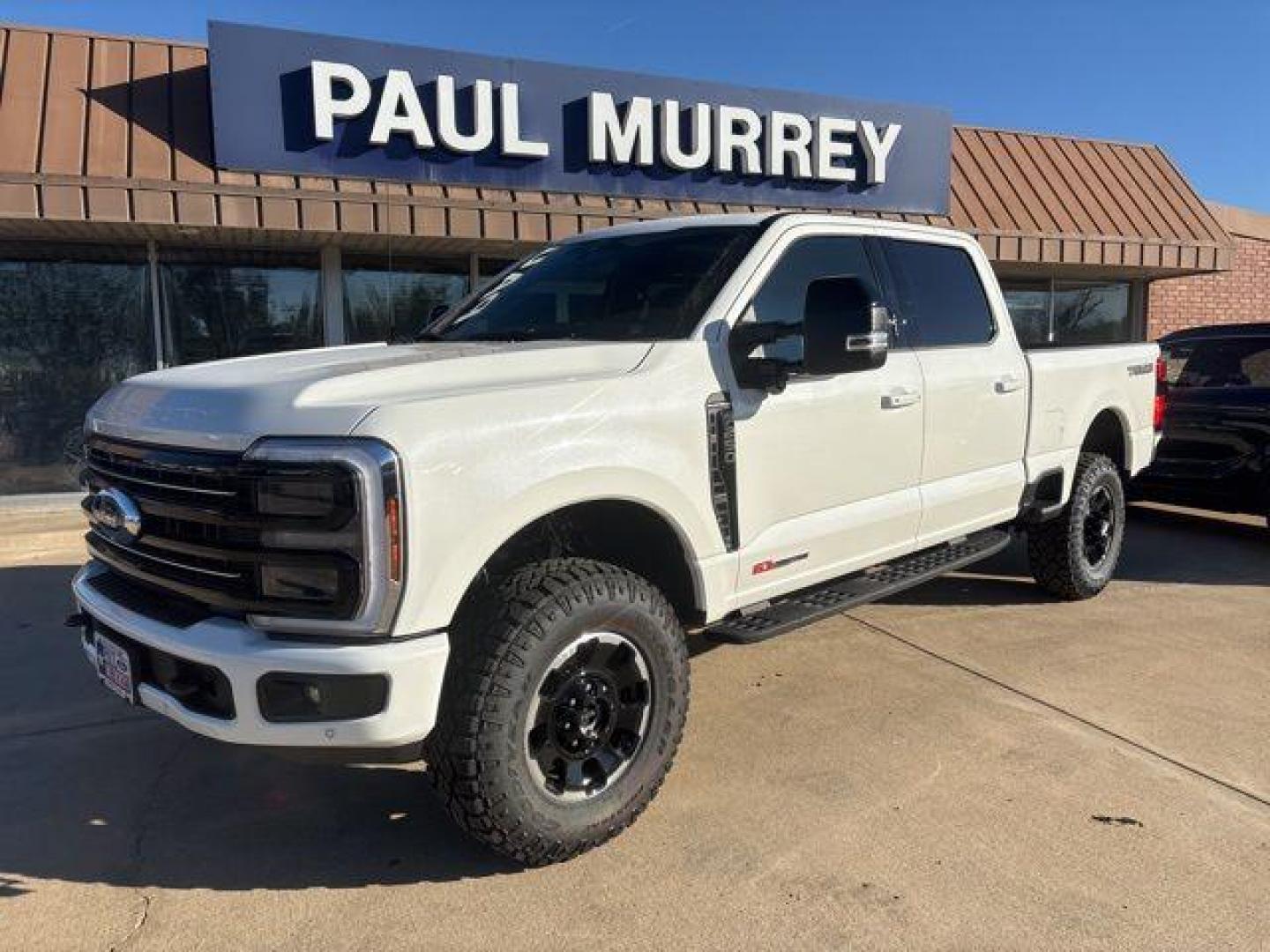 2026 White Metallic /Black Onyx/Platinum Blue Ford F-250SD Platinum (1FT8W2BM5TE) with an 6.7L High Output Power Stroke V8 Diesel engine, Automatic transmission, located at 1105 E Mulberry, Kaufman, TX, 75142, (972) 962-2151, 32.589550, -96.300926 - $5,541 off MSRP!<br><br>4WD, ABS brakes, Alloy wheels, Compass, Electronic Stability Control, Front dual zone A/C, Heated door mirrors, Heated front seats, Heated rear seats, Illuminated entry, Low tire pressure warning, Remote keyless entry, Traction control.<br>Star White Metallic Tri-Coat 2026 Fo - Photo#2