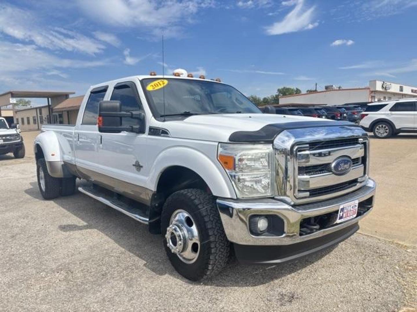 2012 White Ford F-350SD Lariat (1FT8W3DT2CE) with an Power Stroke 6.7L V8 DI 32V OHV Turbodiesel engine, Automatic transmission, located at 1105 E Mulberry, Kaufman, TX, 75142, (972) 962-2151, 32.589550, -96.300926 - White 2012 Ford F-350SD 4D Crew Cab Lariat DRW 4WD TorqShift 6-Speed Automatic with Overdrive Power Stroke 6.7L V8 DI 32V OHV Turbodiesel 4WD.<br><br><br>Recent Arrival! Odometer is 49689 miles below market average!<br><br>Awards:<br> * 2012 KBB.com Brand Image Awards<br>Please call Paul Murrey For - Photo#0