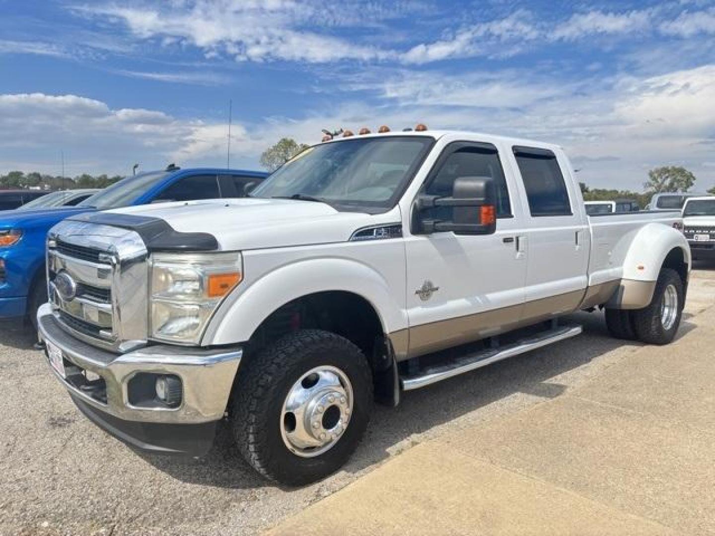 2012 White Ford F-350SD Lariat (1FT8W3DT2CE) with an Power Stroke 6.7L V8 DI 32V OHV Turbodiesel engine, Automatic transmission, located at 1105 E Mulberry, Kaufman, TX, 75142, (972) 962-2151, 32.589550, -96.300926 - White 2012 Ford F-350SD 4D Crew Cab Lariat DRW 4WD TorqShift 6-Speed Automatic with Overdrive Power Stroke 6.7L V8 DI 32V OHV Turbodiesel 4WD.<br><br><br>Recent Arrival! Odometer is 49689 miles below market average!<br><br>Awards:<br> * 2012 KBB.com Brand Image Awards<br>Please call Paul Murrey For - Photo#1