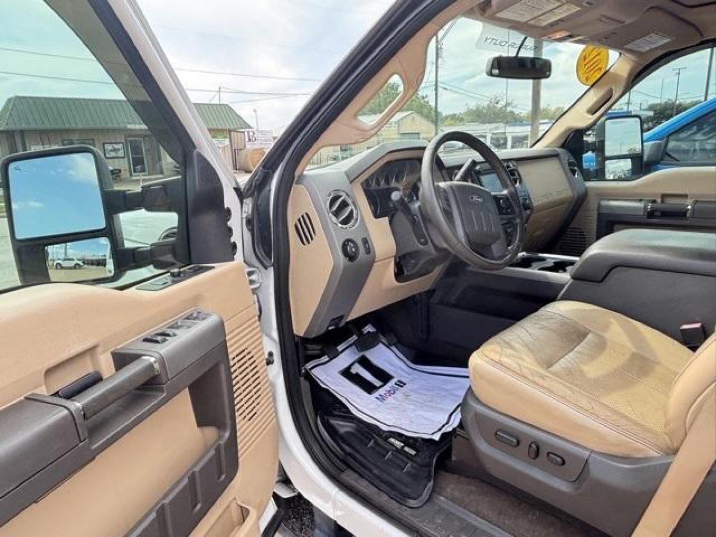 2012 White Ford F-350SD Lariat (1FT8W3DT2CE) with an Power Stroke 6.7L V8 DI 32V OHV Turbodiesel engine, Automatic transmission, located at 1105 E Mulberry, Kaufman, TX, 75142, (972) 962-2151, 32.589550, -96.300926 - White 2012 Ford F-350SD 4D Crew Cab Lariat DRW 4WD TorqShift 6-Speed Automatic with Overdrive Power Stroke 6.7L V8 DI 32V OHV Turbodiesel 4WD.<br><br><br>Recent Arrival! Odometer is 49689 miles below market average!<br><br>Awards:<br> * 2012 KBB.com Brand Image Awards<br>Please call Paul Murrey For - Photo#6