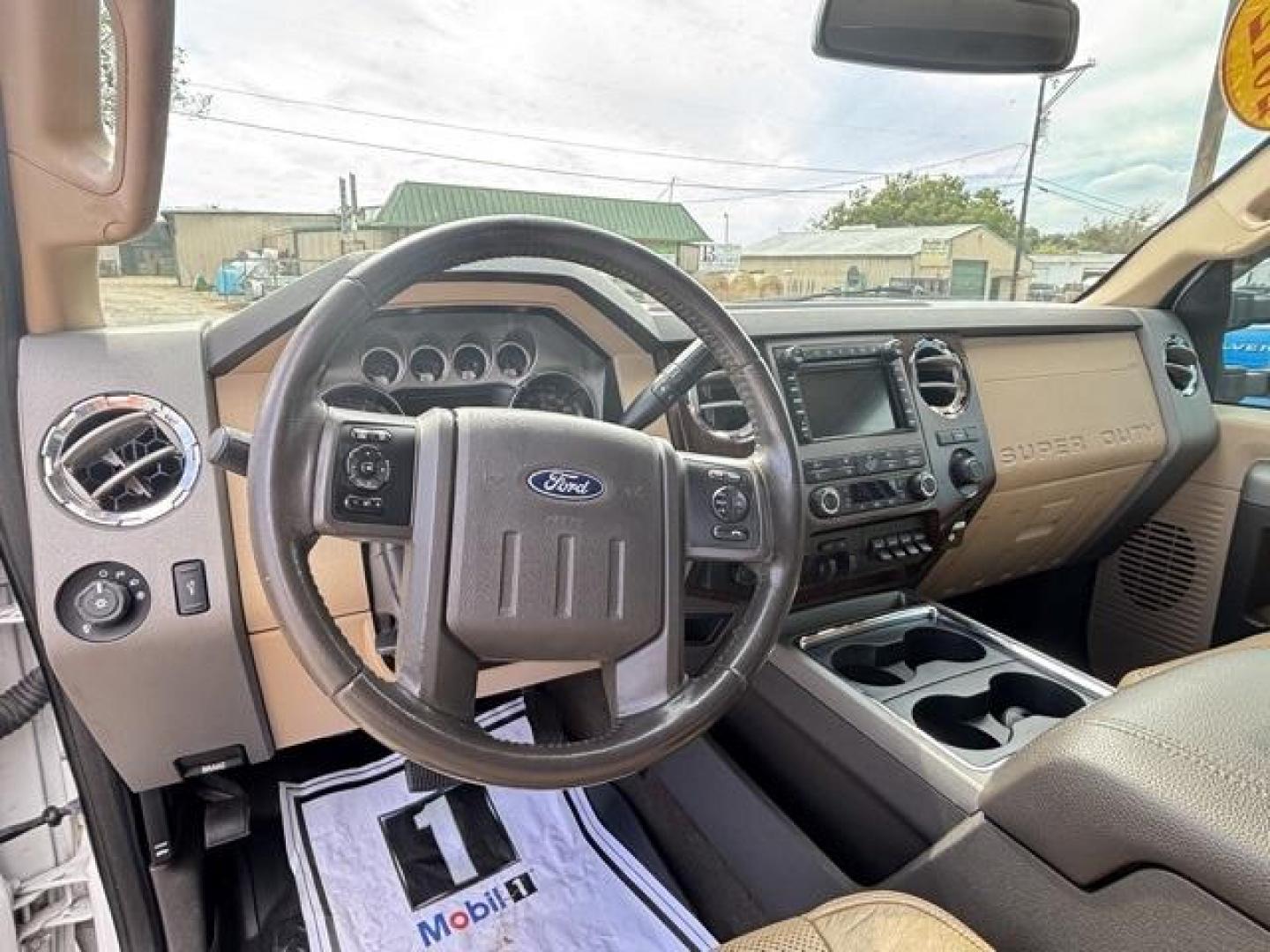 2012 White Ford F-350SD Lariat (1FT8W3DT2CE) with an Power Stroke 6.7L V8 DI 32V OHV Turbodiesel engine, Automatic transmission, located at 1105 E Mulberry, Kaufman, TX, 75142, (972) 962-2151, 32.589550, -96.300926 - White 2012 Ford F-350SD 4D Crew Cab Lariat DRW 4WD TorqShift 6-Speed Automatic with Overdrive Power Stroke 6.7L V8 DI 32V OHV Turbodiesel 4WD.<br><br><br>Recent Arrival! Odometer is 49689 miles below market average!<br><br>Awards:<br> * 2012 KBB.com Brand Image Awards<br>Please call Paul Murrey For - Photo#8