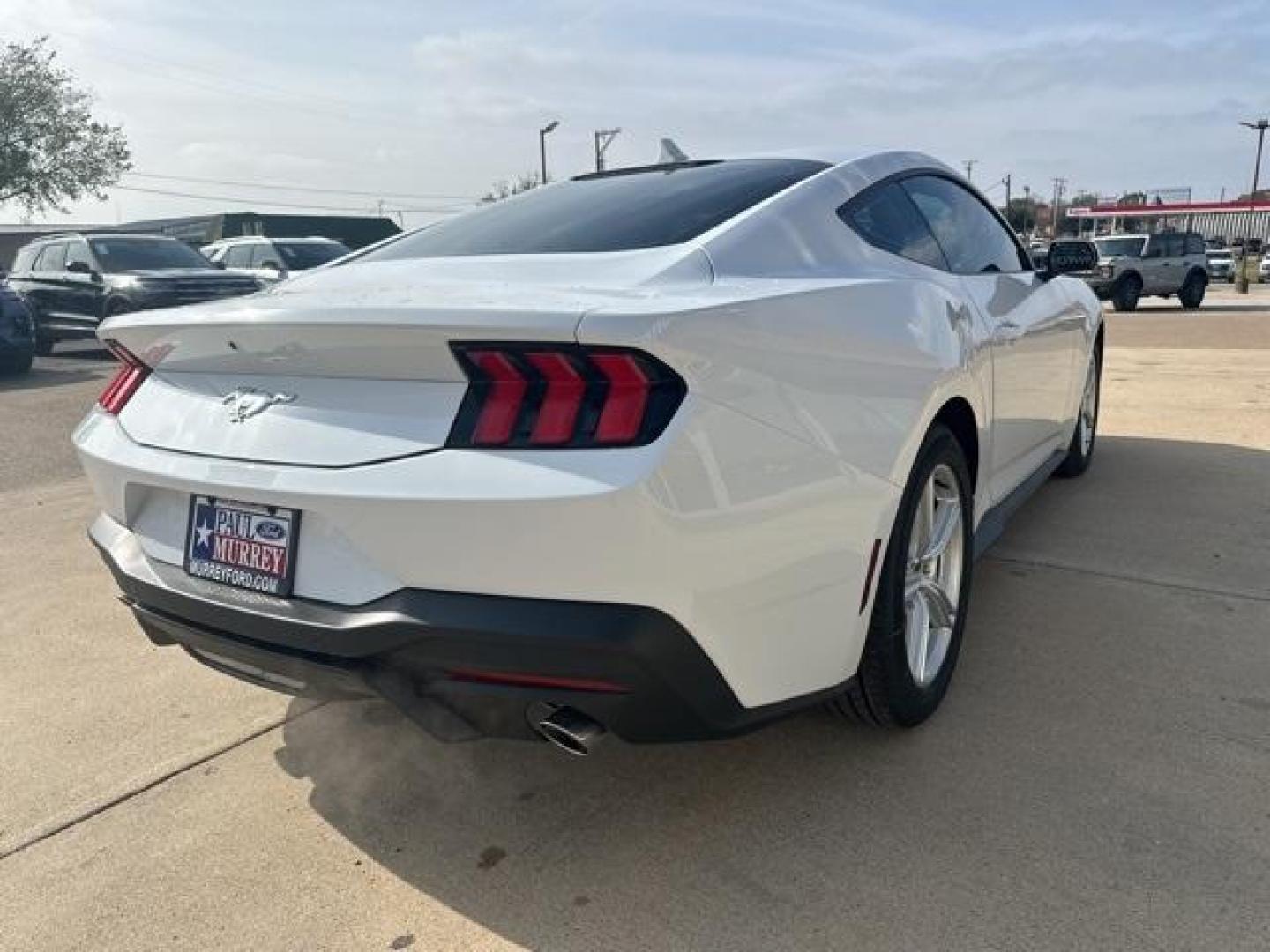 2026 Oxford White /Black Onyx Ford Mustang EcoBoost (1FA6P8TH2T5) with an EcoBoost 2.3L I4 GTDi DOHC Turbocharged VCT engine, Automatic transmission, located at 1105 E Mulberry, Kaufman, TX, 75142, (972) 962-2151, 32.589550, -96.300926 - Oxford White 2026 Ford Mustang 2D Coupe EcoBoost RWD 10-Speed Automatic EcoBoost 2.3L I4 GTDi DOHC Turbocharged VCT 21/32 City/Highway MPG<br><br>21/32 City/Highway MPG - Photo#4