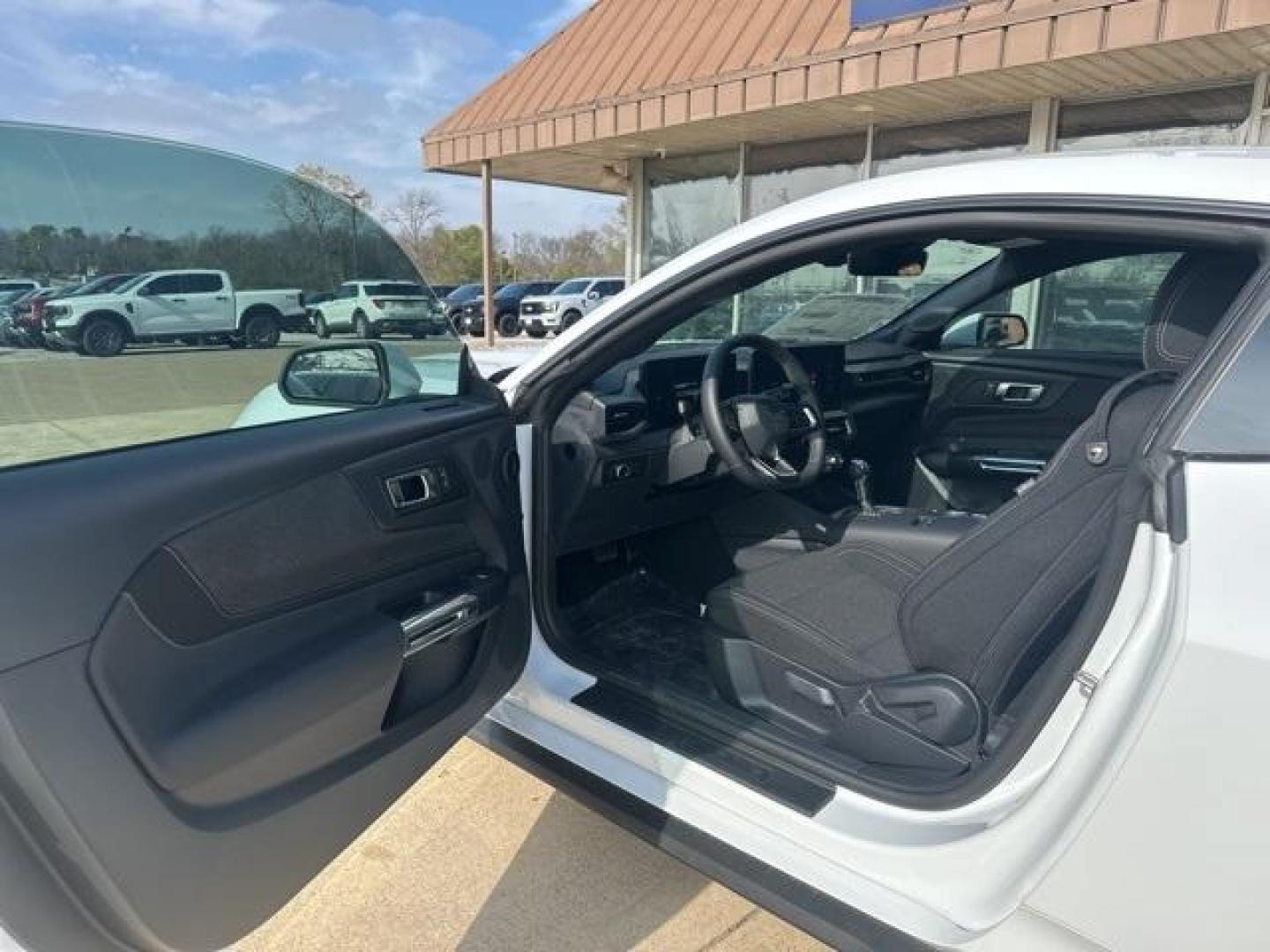 2026 Oxford White /Black Onyx Ford Mustang EcoBoost (1FA6P8TH2T5) with an EcoBoost 2.3L I4 GTDi DOHC Turbocharged VCT engine, Automatic transmission, located at 1105 E Mulberry, Kaufman, TX, 75142, (972) 962-2151, 32.589550, -96.300926 - Oxford White 2026 Ford Mustang 2D Coupe EcoBoost RWD 10-Speed Automatic EcoBoost 2.3L I4 GTDi DOHC Turbocharged VCT 21/32 City/Highway MPG<br><br>21/32 City/Highway MPG - Photo#6