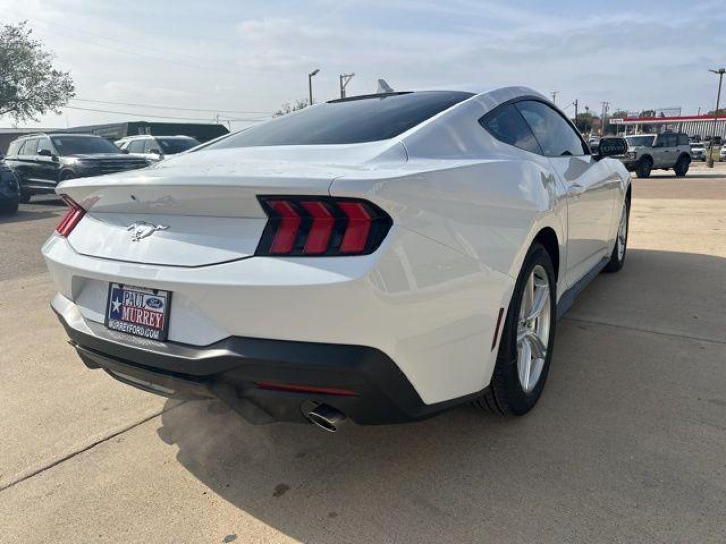 2026 Oxford White /Black Onyx Ford Mustang EcoBoost (1FA6P8TH2T5) with an EcoBoost 2.3L I4 GTDi DOHC Turbocharged VCT engine, Automatic transmission, located at 1105 E Mulberry, Kaufman, TX, 75142, (972) 962-2151, 32.589550, -96.300926 - Photo#4