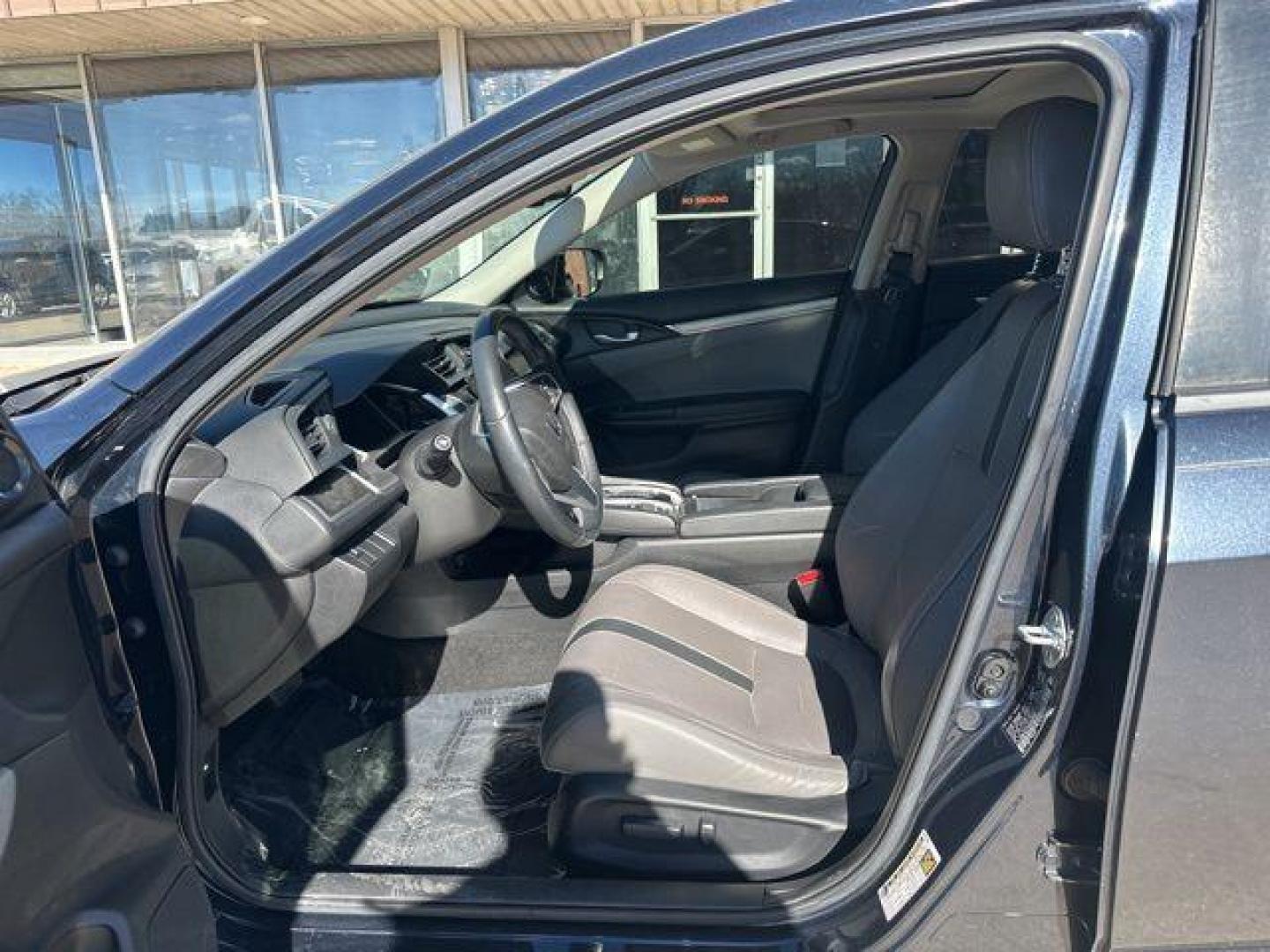 2018 Crystal Black Pearl /Black Honda Civic EX-L (JHMFC1F78JX) with an 1.5L I-4 DI DOHC Turbocharged engine, CVT transmission, located at 1105 E Mulberry, Kaufman, TX, 75142, (972) 962-2151, 32.589550, -96.300926 - Black 2018 Honda Civic 4D Sedan EX-L FWD CVT 1.5L I-4 DI DOHC Turbocharged Black Leather. Priced below KBB Fair Purchase Price!<br><br><br>Odometer is 13864 miles below market average! 32/42 City/Highway MPG<br><br>Awards:<br> * 2018 KBB.com 10 Most Awarded Brands * 2018 KBB.com Brand Image Award - Photo#7