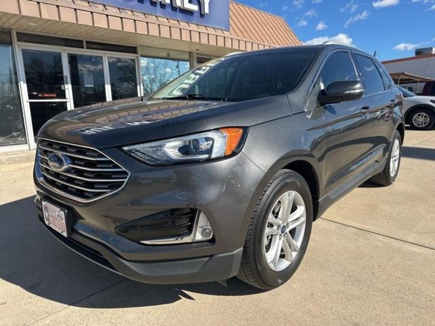 2019 Magnetic /Ebony Ford Edge SEL (2FMPK3J98KB) with an EcoBoost 2.0L I4 GTDi DOHC Turbocharged VCT engine, Automatic transmission, located at 1105 E Mulberry, Kaufman, TX, 75142, (972) 962-2151, 32.589550, -96.300926 - Magnetic 2019 Ford Edge 4D Sport Utility SEL FWD 8-Speed Automatic EcoBoost 2.0L I4 GTDi DOHC Turbocharged VCT<br><br><br>22/29 City/Highway MPG<br><br><br>Please call Paul Murrey Ford Inc. In Kaufman Texas A Family Dealership Since 1952 Serving the Dallas Fort Worth and East Texas areas for over 70 - Photo#1