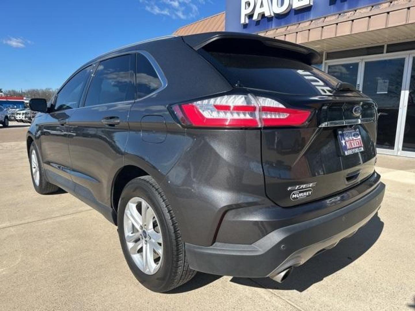 2019 Magnetic /Ebony Ford Edge SEL (2FMPK3J98KB) with an EcoBoost 2.0L I4 GTDi DOHC Turbocharged VCT engine, Automatic transmission, located at 1105 E Mulberry, Kaufman, TX, 75142, (972) 962-2151, 32.589550, -96.300926 - Magnetic 2019 Ford Edge 4D Sport Utility SEL FWD 8-Speed Automatic EcoBoost 2.0L I4 GTDi DOHC Turbocharged VCT<br><br><br>22/29 City/Highway MPG<br><br><br>Please call Paul Murrey Ford Inc. In Kaufman Texas A Family Dealership Since 1952 Serving the Dallas Fort Worth and East Texas areas for over 70 - Photo#2