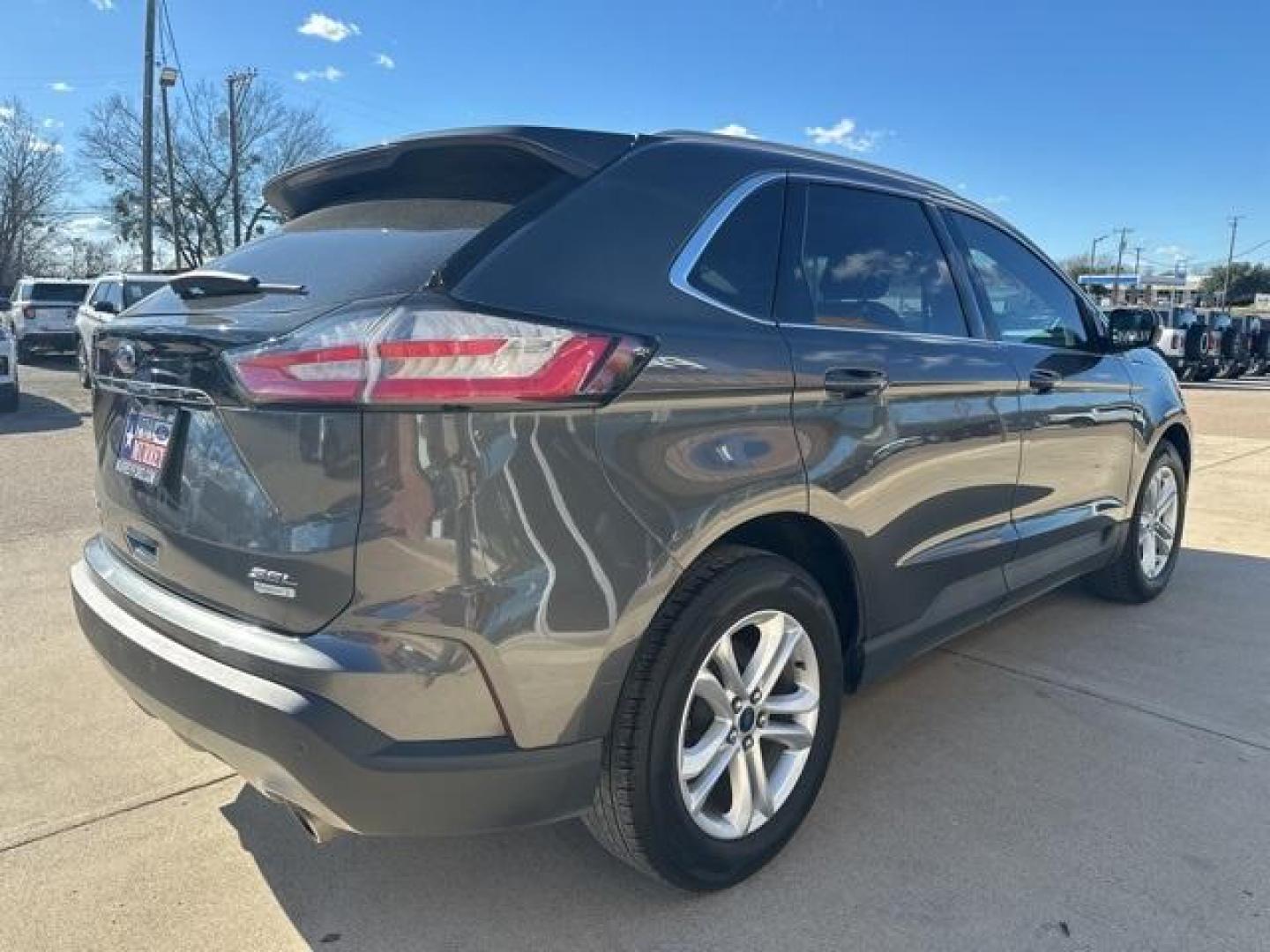 2019 Magnetic /Ebony Ford Edge SEL (2FMPK3J98KB) with an EcoBoost 2.0L I4 GTDi DOHC Turbocharged VCT engine, Automatic transmission, located at 1105 E Mulberry, Kaufman, TX, 75142, (972) 962-2151, 32.589550, -96.300926 - Magnetic 2019 Ford Edge 4D Sport Utility SEL FWD 8-Speed Automatic EcoBoost 2.0L I4 GTDi DOHC Turbocharged VCT<br><br><br>22/29 City/Highway MPG<br><br><br>Please call Paul Murrey Ford Inc. In Kaufman Texas A Family Dealership Since 1952 Serving the Dallas Fort Worth and East Texas areas for over 70 - Photo#3