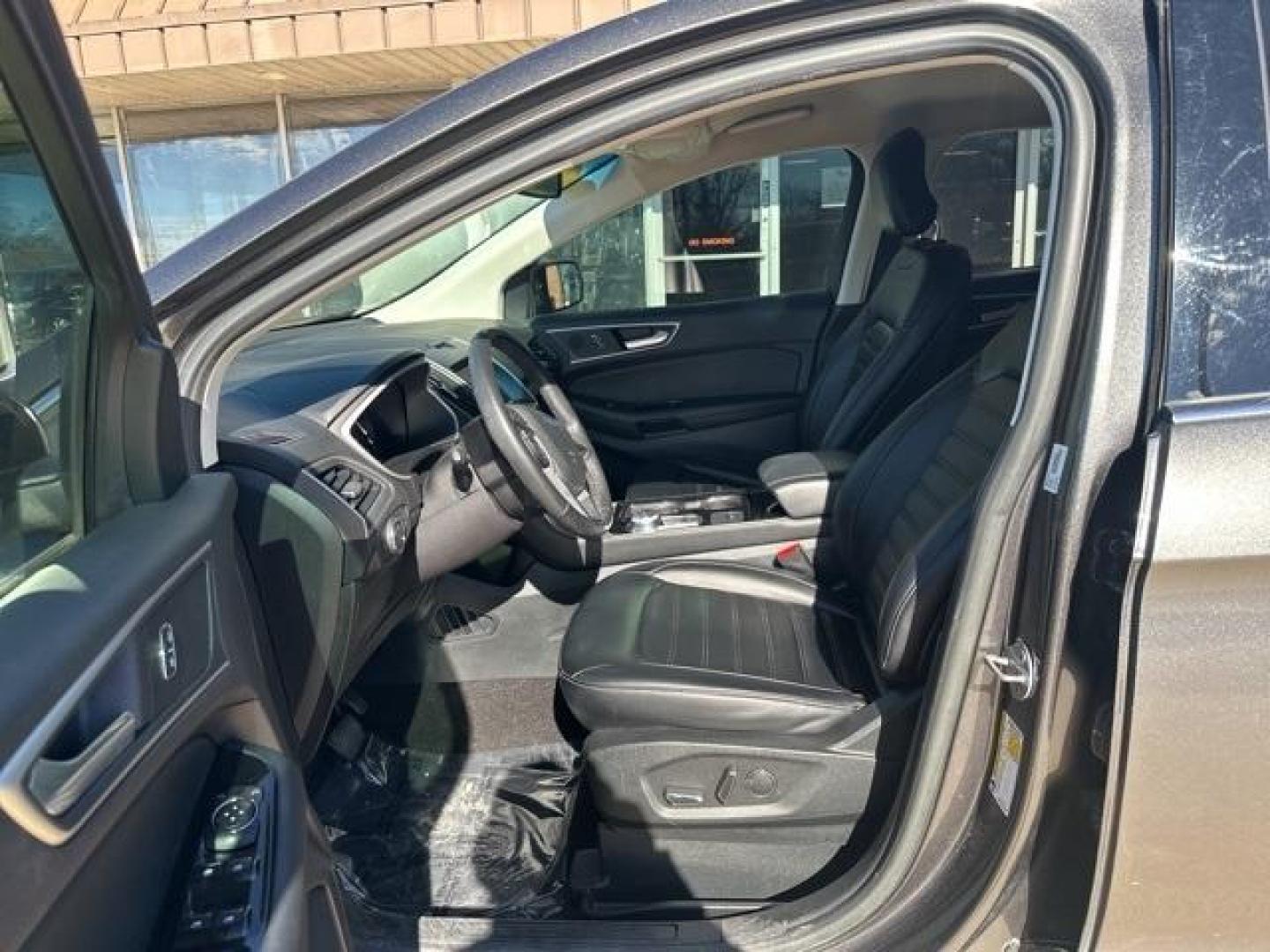 2019 Magnetic /Ebony Ford Edge SEL (2FMPK3J98KB) with an EcoBoost 2.0L I4 GTDi DOHC Turbocharged VCT engine, Automatic transmission, located at 1105 E Mulberry, Kaufman, TX, 75142, (972) 962-2151, 32.589550, -96.300926 - Magnetic 2019 Ford Edge 4D Sport Utility SEL FWD 8-Speed Automatic EcoBoost 2.0L I4 GTDi DOHC Turbocharged VCT<br><br><br>22/29 City/Highway MPG<br><br><br>Please call Paul Murrey Ford Inc. In Kaufman Texas A Family Dealership Since 1952 Serving the Dallas Fort Worth and East Texas areas for over 70 - Photo#6