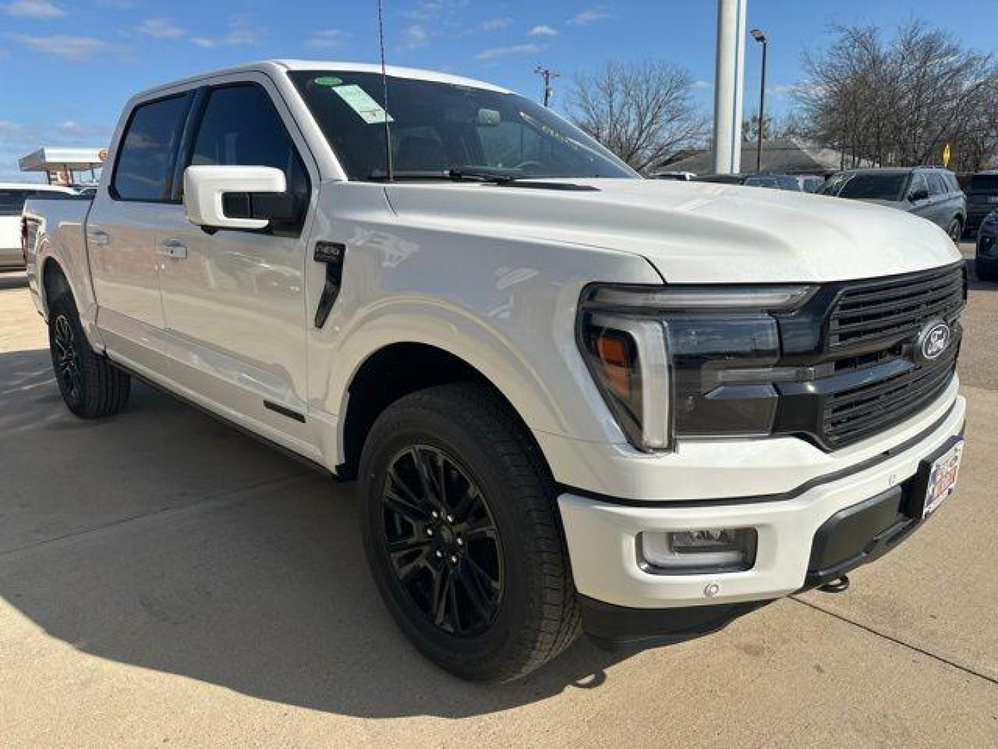 2026 Star White Metallic Tri-Coat /Black Ford F-150 Platinum (1FTFW7LD2TF) with an 3.5L PowerBoost Full-Hybrid V6 engine, Automatic transmission, located at 1105 E Mulberry, Kaufman, TX, 75142, (972) 962-2151, 32.589550, -96.300926 - 3.5L PowerBoost Full-Hybrid V6, 4WD.<br>Star White Metallic Tri-Coat 2026 Ford F-150 4D SuperCrew Platinum 4WD 10-Speed Automatic 3.5L PowerBoost Full-Hybrid V6 23/23 City/Highway MPG - Photo#5