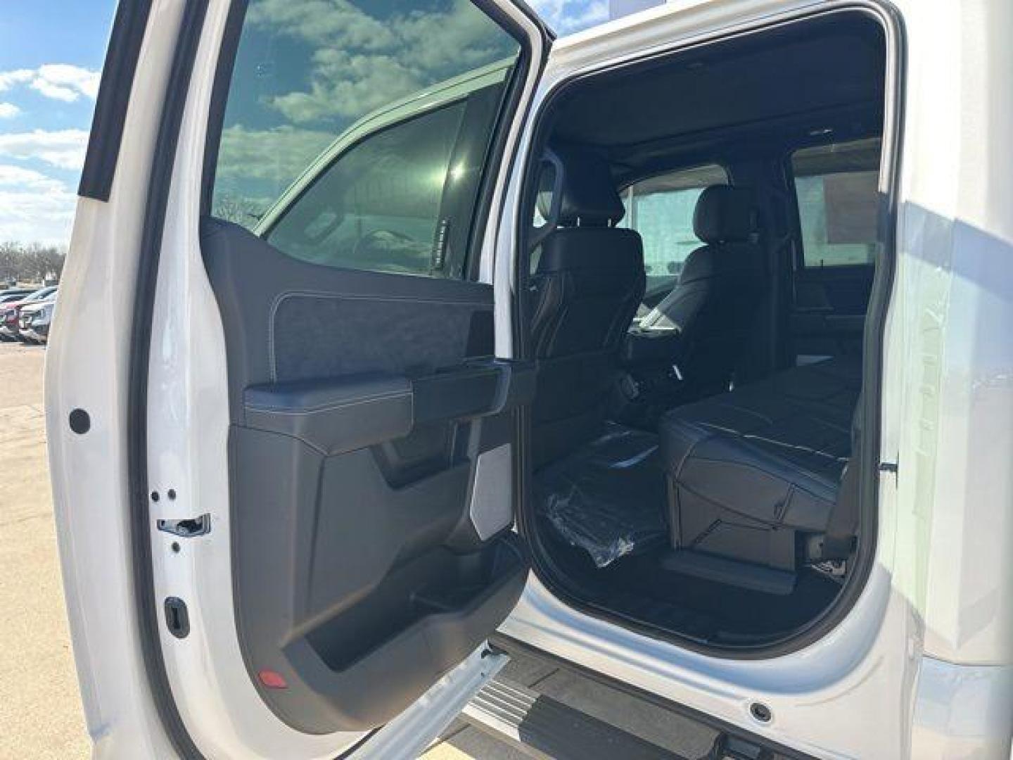 2026 Star White Metallic Tri-Coat /Black Ford F-150 Platinum (1FTFW7LD2TF) with an 3.5L PowerBoost Full-Hybrid V6 engine, Automatic transmission, located at 1105 E Mulberry, Kaufman, TX, 75142, (972) 962-2151, 32.589550, -96.300926 - 3.5L PowerBoost Full-Hybrid V6, 4WD.<br>Star White Metallic Tri-Coat 2026 Ford F-150 4D SuperCrew Platinum 4WD 10-Speed Automatic 3.5L PowerBoost Full-Hybrid V6 23/23 City/Highway MPG - Photo#11