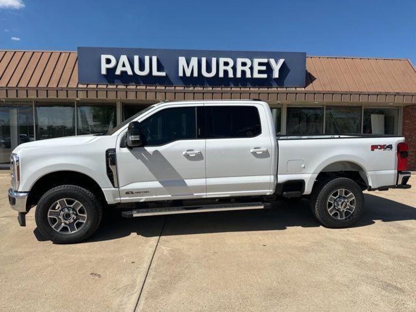 2026 Oxford White /Baja Ford F-350SD Lariat (1FT8W3BT4TE) with an Power Stroke 6.7L V8 DI 32V OHV Turbodiesel engine, Automatic transmission, located at 1105 E Mulberry, Kaufman, TX, 75142, (972) 962-2151, 32.589550, -96.300926 - $3,554 off MSRP!<br><br>4WD.<br>Oxford White 2026 Ford F-350SD 4D Crew Cab Lariat 4WD 10-Speed Automatic Power Stroke 6.7L V8 DI 32V OHV Turbodiesel - Photo#0