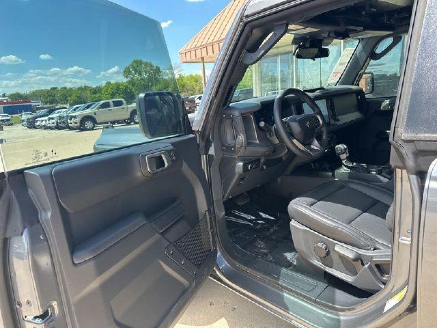 2026 Carbonized Gray Metallic /Black Onyx Interior Ford Bronco Big Bend (1FMDE7BH1TL) with an 2.3L EcoBoost I-4 engine, Automatic transmission, located at 1105 E Mulberry, Kaufman, TX, 75142, (972) 962-2151, 32.589550, -96.300926 - $750 off MSRP!<br><br><br>Carbonized Gray Metallic 2026 Ford Bronco 4D Sport Utility Big Bend 4WD 10-Speed Automatic 2.3L EcoBoost I-4 18/22 City/Highway MPG Price includes: $750 - Retail Customer Cash. Exp. 04/30/2026 - Photo#5