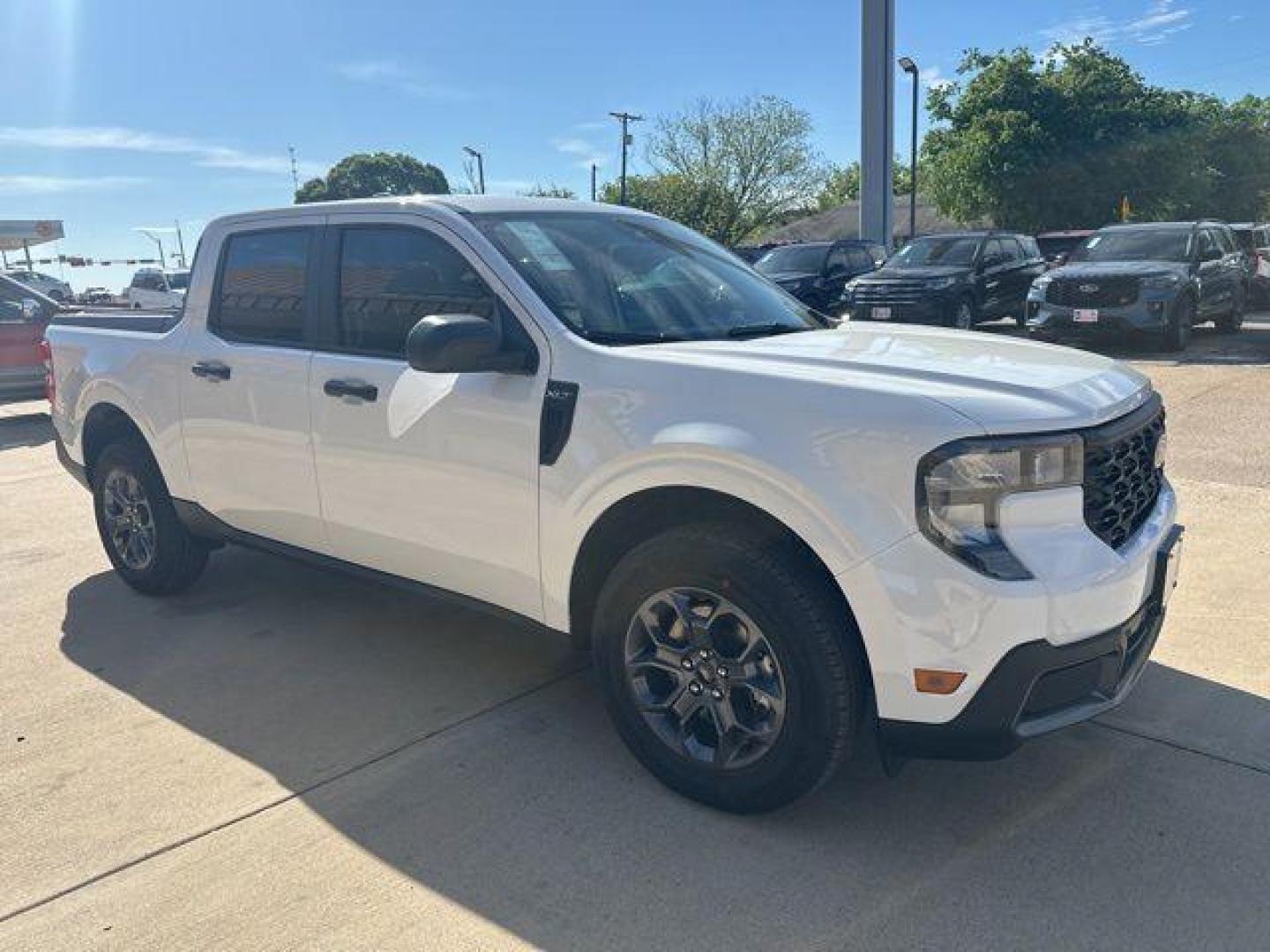 2026 Oxford White /Gray Ford Maverick XLT (3FTTW8H38TR) with an 2.5L I-4 Hybrid engine, CVT transmission, located at 1105 E Mulberry, Kaufman, TX, 75142, (972) 962-2151, 32.589550, -96.300926 - Photo#4