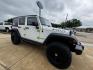 2017 Bright White Clearcoat /Black Jeep Wrangler Unlimited Rubicon (1C4BJWFGXHL) with an 3.6L V6 24V VVT engine, Automatic transmission, located at 1105 E Mulberry, Kaufman, TX, 75142, (972) 962-2151, 32.589550, -96.300926 - Photo#3