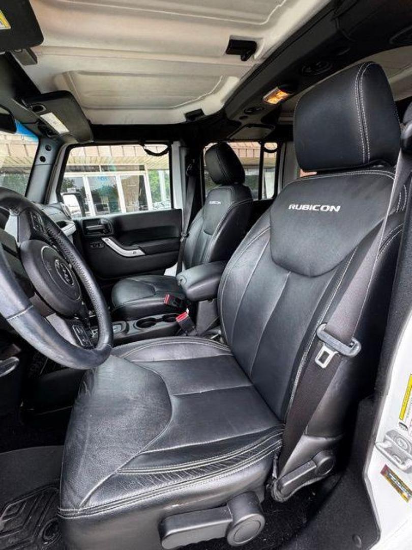2017 Bright White Clearcoat /Black Jeep Wrangler Unlimited Rubicon (1C4BJWFGXHL) with an 3.6L V6 24V VVT engine, Automatic transmission, located at 1105 E Mulberry, Kaufman, TX, 75142, (972) 962-2151, 32.589550, -96.300926 - Photo#11