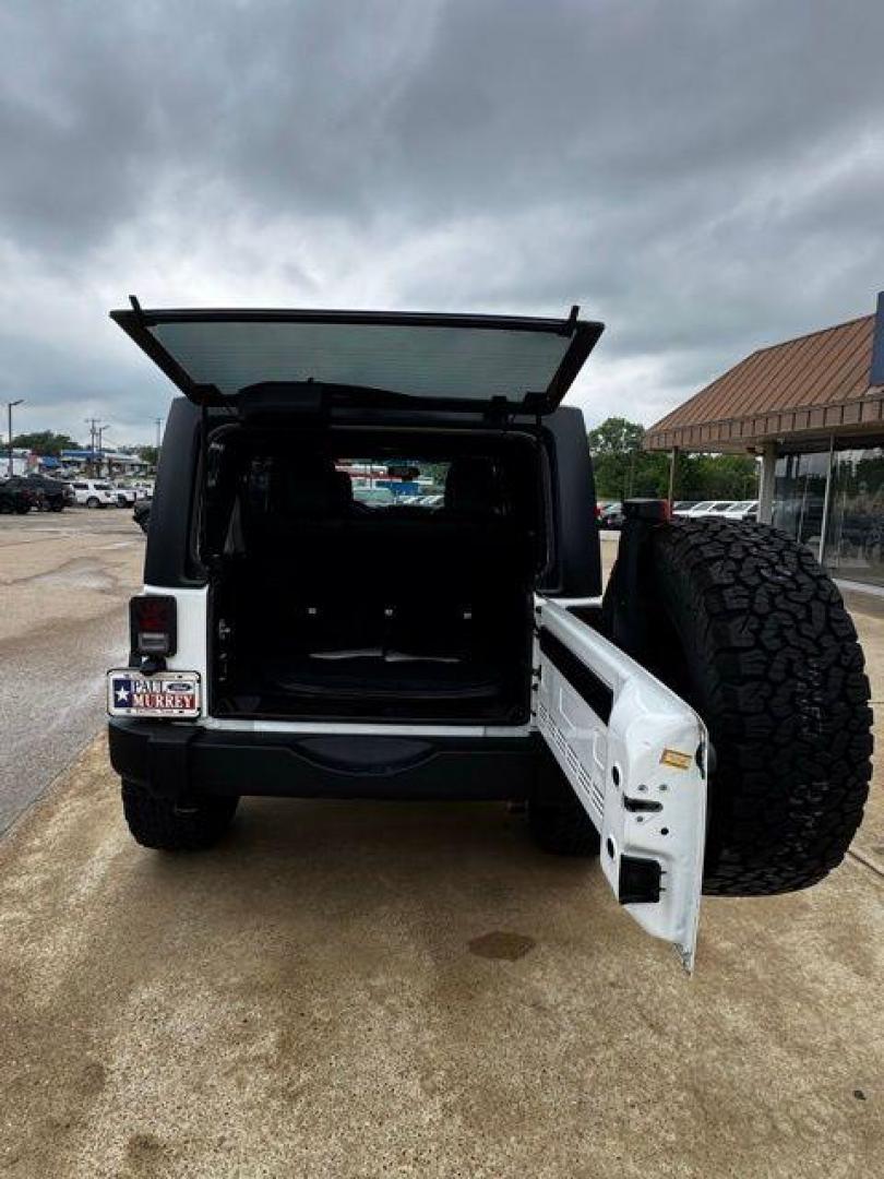2017 Bright White Clearcoat /Black Jeep Wrangler Unlimited Rubicon (1C4BJWFGXHL) with an 3.6L V6 24V VVT engine, Automatic transmission, located at 1105 E Mulberry, Kaufman, TX, 75142, (972) 962-2151, 32.589550, -96.300926 - Photo#23