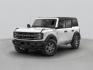 2025 Gray Metallic /Navy Pier Ford Bronco Heritage Edition (1FMEE4DPXSL) with an 2.7L EcoBoost V6 engine, Automatic transmission, located at 1105 E Mulberry, Kaufman, TX, 75142, (972) 962-2151, 32.589550, -96.300926 - Recent Arrival! $2,750 off MSRP!<br><br><br>Gray Metallic 2025 Ford Bronco 4D Sport Utility Heritage Edition 4WD 10-Speed Automatic 2.7L EcoBoost V6 17/18 City/Highway MPG Price includes: $2750 - Retail Customer Cash. Exp. 04/30/2026 - Photo#0