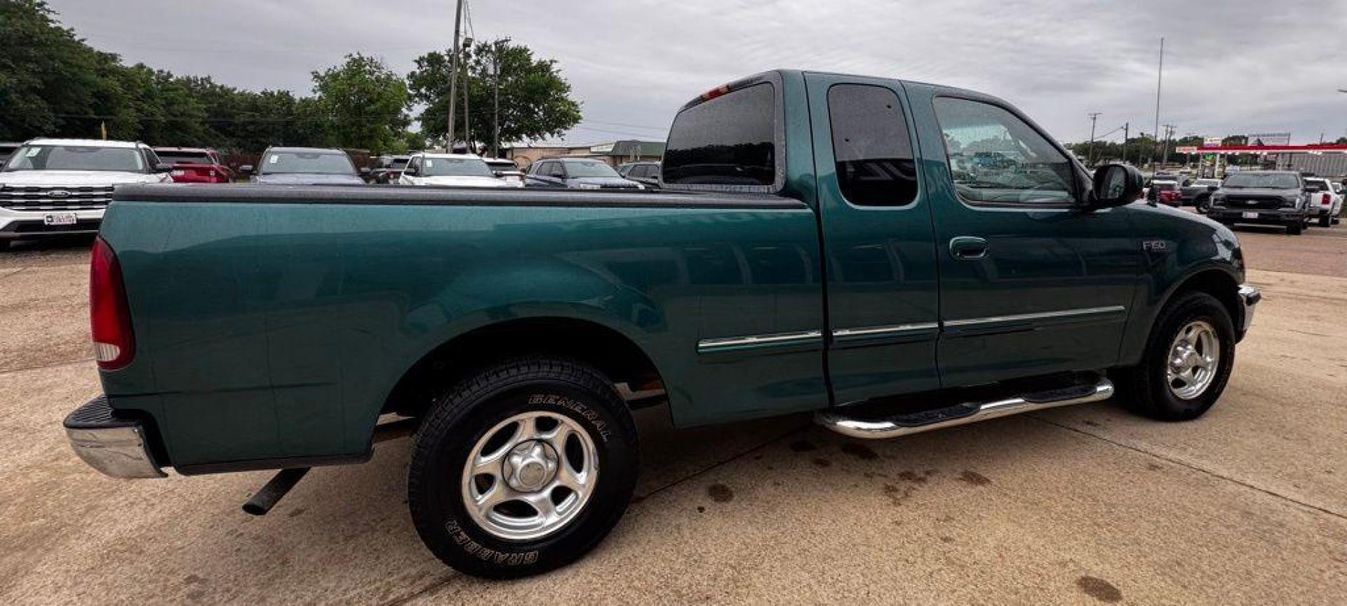 1998 Pacific Green Clearcoat Metallic Ford F-150 (1FTZX1727WK) with an 4.2L V6 EFI engine, Automatic transmission, located at 1105 E Mulberry, Kaufman, TX, 75142, (972) 962-2151, 32.589550, -96.300926 - Green 1998 Ford F-150 RWD 4-Speed Automatic with Overdrive 4.2L V6 EFI<br><br><br>Recent Arrival!<br><br><br>Please call Paul Murrey Ford Inc. In Kaufman Texas A Family Dealership Since 1952 Serving the Dallas Fort Worth and East Texas areas for over 70 years. Please call 972-962-2151 www.murreyford - Photo#2