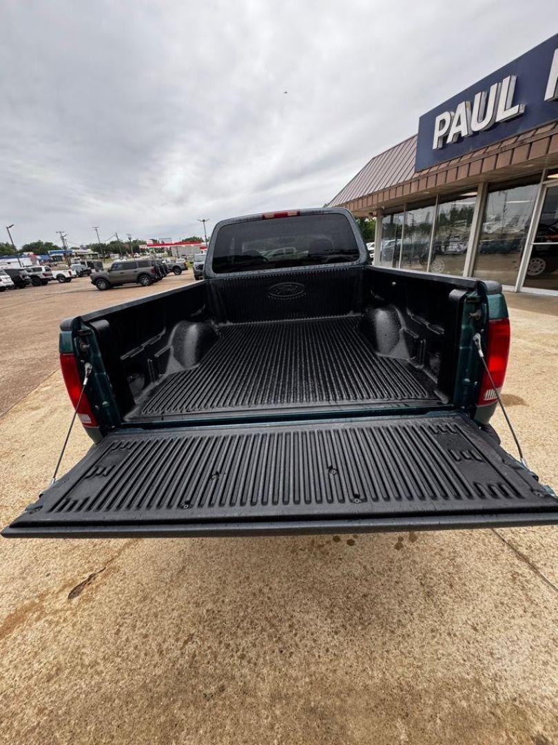 1998 Pacific Green Clearcoat Metallic Ford F-150 (1FTZX1727WK) with an 4.2L V6 EFI engine, Automatic transmission, located at 1105 E Mulberry, Kaufman, TX, 75142, (972) 962-2151, 32.589550, -96.300926 - Photo#5