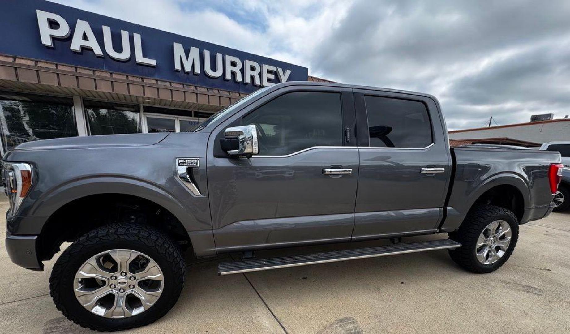 2021 Gray Metallic /Black Ford F-150 Platinum (1FTFW1E83MF) with an 3.5L V6 EcoBoost engine, Automatic transmission, located at 1105 E Mulberry, Kaufman, TX, 75142, (972) 962-2151, 32.589550, -96.300926 - Gray Metallic 2021 Ford F-150 4D SuperCrew Platinum 4WD 10-Speed Automatic 3.5L V6 EcoBoost 4WD.<br><br><br>Recent Arrival! Odometer is 5572 miles below market average!<br><br>Awards:<br> * NACTOY 2021 North American Truck of the Year<br>Please call Paul Murrey Ford Inc. In Kaufman Texas A Family D - Photo#1