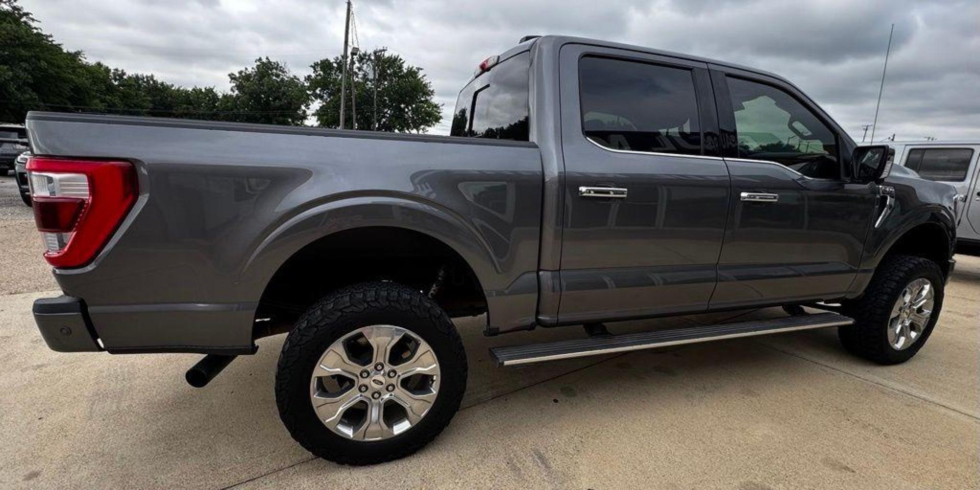 2021 Gray Metallic /Black Ford F-150 Platinum (1FTFW1E83MF) with an 3.5L V6 EcoBoost engine, Automatic transmission, located at 1105 E Mulberry, Kaufman, TX, 75142, (972) 962-2151, 32.589550, -96.300926 - Gray Metallic 2021 Ford F-150 4D SuperCrew Platinum 4WD 10-Speed Automatic 3.5L V6 EcoBoost 4WD.<br><br><br>Recent Arrival! Odometer is 5572 miles below market average!<br><br>Awards:<br> * NACTOY 2021 North American Truck of the Year<br>Please call Paul Murrey Ford Inc. In Kaufman Texas A Family D - Photo#11
