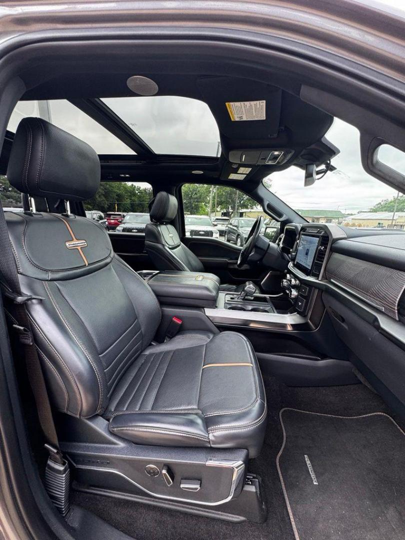 2021 Gray Metallic /Black Ford F-150 Platinum (1FTFW1E83MF) with an 3.5L V6 EcoBoost engine, Automatic transmission, located at 1105 E Mulberry, Kaufman, TX, 75142, (972) 962-2151, 32.589550, -96.300926 - Gray Metallic 2021 Ford F-150 4D SuperCrew Platinum 4WD 10-Speed Automatic 3.5L V6 EcoBoost 4WD.<br><br><br>Recent Arrival! Odometer is 5572 miles below market average!<br><br>Awards:<br> * NACTOY 2021 North American Truck of the Year<br>Please call Paul Murrey Ford Inc. In Kaufman Texas A Family D - Photo#32