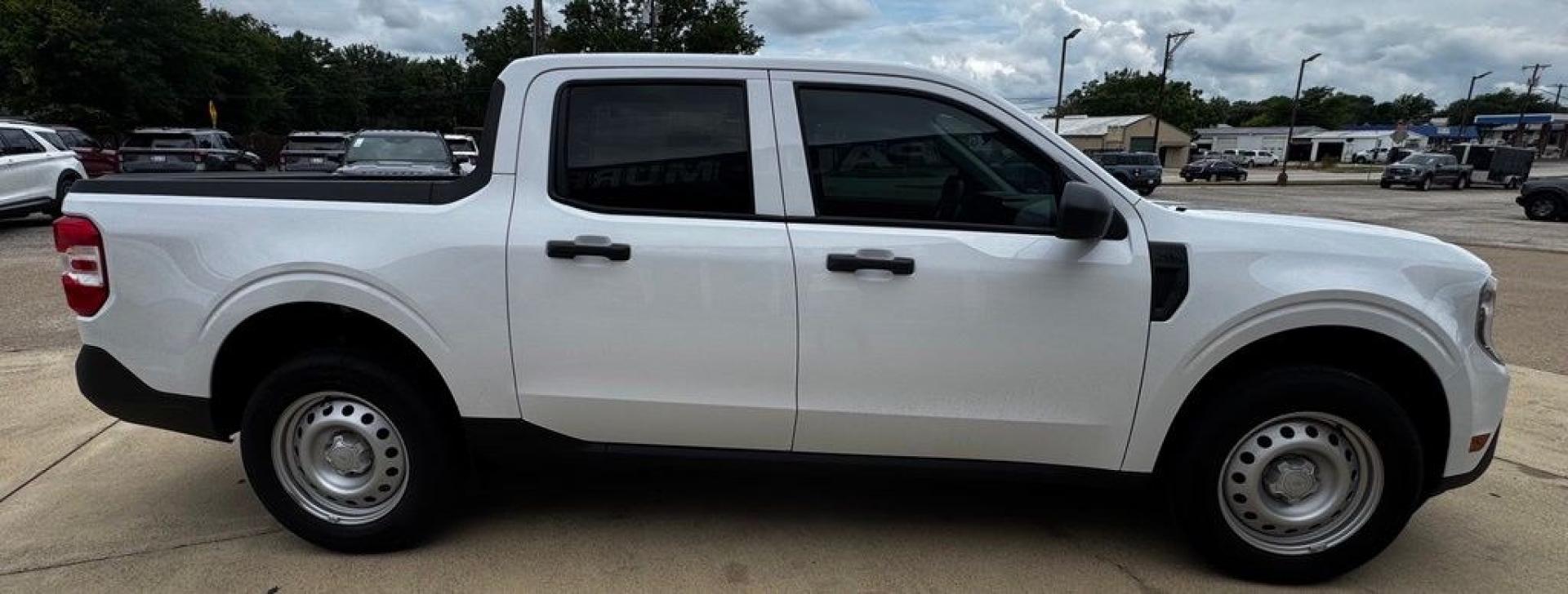 2026 Oxford White /Black Onyx/Dark Slate Ford Maverick XL (3FTTW8A33TR) with an 2.5L I-4 Hybrid engine, CVT transmission, located at 1105 E Mulberry, Kaufman, TX, 75142, (972) 962-2151, 32.589550, -96.300926 - 2.5L I-4 Hybrid.<br>Oxford White 2026 Ford Maverick 4D Crew Cab XL FWD CVT 2.5L I-4 Hybrid 42/35 City/Highway MPG<br><br>42/35 City/Highway MPG- Photo#8
