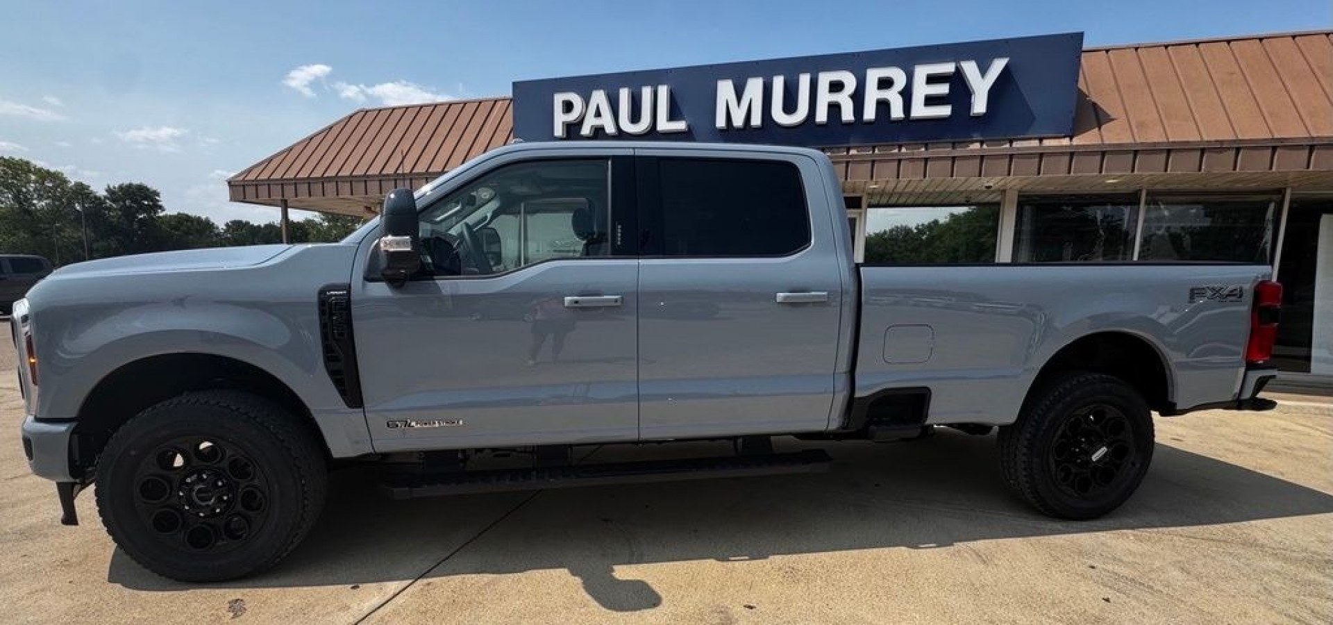 2026 Gray Metallic /Black Onyx Ford F-350SD Lariat (1FT8W3BT5TE) with an Power Stroke 6.7L V8 DI 32V OHV Turbodiesel engine, Automatic transmission, located at 1105 E Mulberry, Kaufman, TX, 75142, (972) 962-2151, 32.589550, -96.300926 - Recent Arrival! $1,000 off MSRP!<br><br>4WD.<br>Glacier Gray Metallic TriCoat 2026 Ford F-350SD 4D Crew Cab Lariat 4WD 10-Speed Automatic Power Stroke 6.7L V8 DI 32V OHV Turbodiesel Price includes: $1000 - Retail Customer Cash. Exp. 09/30/2026- Photo#1