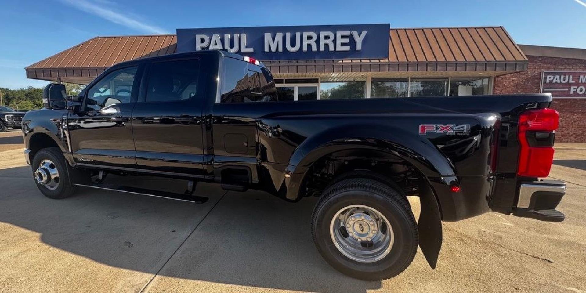 2026 Black Metallic /Black Onyx Ford F-350SD Lariat (1FT8W3DT7TE) with an Power Stroke 6.7L V8 DI 32V OHV Turbodiesel engine, Automatic transmission, located at 1105 E Mulberry, Kaufman, TX, 75142, (972) 962-2151, 32.589550, -96.300926 - $3,901 off MSRP!<br><br>4WD.<br>Agate Black Metallic 2026 Ford F-350SD 4D Crew Cab Lariat DRW 4WD 10-Speed Automatic Power Stroke 6.7L V8 DI 32V OHV Turbodiesel- Photo#1